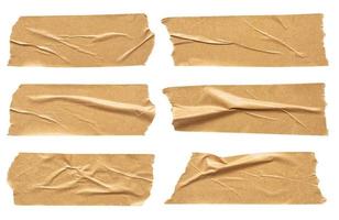 Brown adhesive paper tape set isolated on white background photo