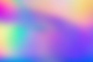 Abstract blur holographic rainbow foil iridescent background photo