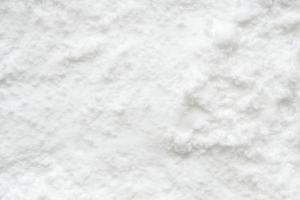 White snow texture background high angle view photo