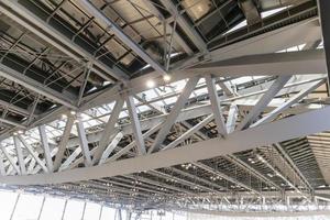 Truss structures in steel frame construction,big roof made of steel photo