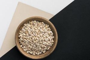 Uncooked Pearled Barley in a Bowl photo