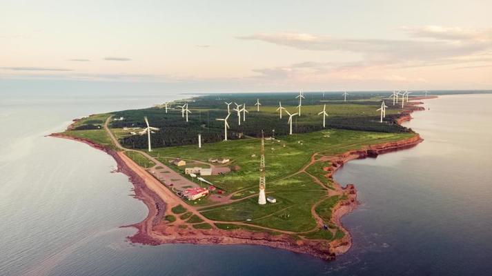 Distance view of Lighthouse and Windmill in the Prince Edward Islands, Canada