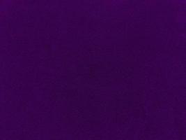 Purple velvet fabric texture used as background. Empty purple fabric background of soft and smooth textile material. There is space for text. photo