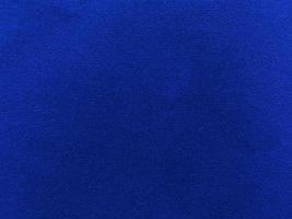 Blue  velvet fabric texture used as background. Empty blue fabric background of soft and smooth textile material. There is space for text. photo