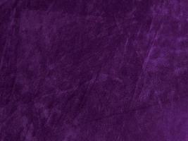 Purple velvet fabric texture used as background. Empty purple fabric background of soft and smooth textile material. There is space for text. photo