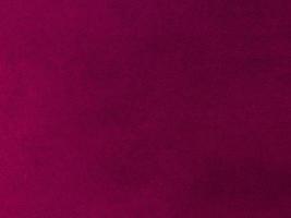 Magenta velvet fabric texture used as background. Empty magenta fabric background of soft and smooth textile material. There is space for text. photo