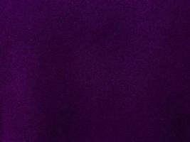 Purple velvet fabric texture used as background. Empty purple fabric background of soft and smooth textile material. There is space for text. photo