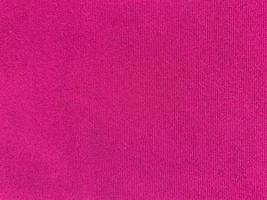 Pink velvet fabric texture used as background. Empty pink fabric background of soft and smooth textile material. There is space for text. photo