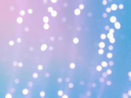 Abstract blue blurred bokeh light on soft light background.In concept Christmas or New Year holiday card template. Magic falling snow backdrop. photo