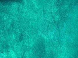 Dark green old velvet fabric texture used as background. Empty green fabric background of soft and smooth textile material. There is space for text. photo