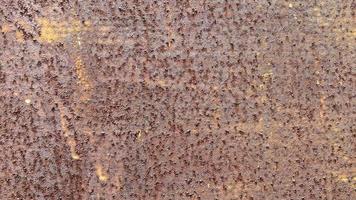 Seamless surface of rusted steel It has a rough, brown texture suitable for making a background. And vintage wallpapers have a space for writing messages. photo