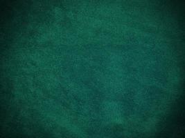 Dark green old velvet fabric texture used as background. Empty green fabric background of soft and smooth textile material. There is space for text. photo