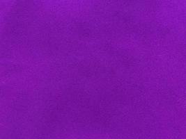 Purple velvet fabric texture used as background. Empty purple fabric background of soft and smooth textile material. There is space for text. photo