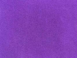 Purple velvet fabric texture used as background. Empty purple fabric background of soft and smooth textile material. There is space for text. photo