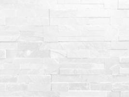 Seamless texture of white grey brick stone wall a rough surface, with space for text, for a background.. photo