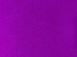 Purple velvet fabric texture used as background. Empty purple fabric background of soft and smooth textile material. There is space for text. photo