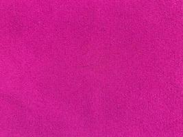 Pink velvet fabric texture used as background. Empty pink fabric background of soft and smooth textile material. There is space for text. photo
