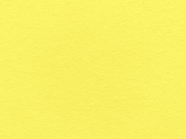Seamless texture of yellow cement wall a rough surface, with space for text, for a background. photo