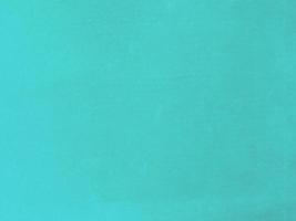 turquoise velvet fabric texture used as background. Empty turquoise fabric background of soft and smooth textile material. There is space for text. photo