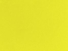 Yellow velvet fabric texture used as background. Empty yellow fabric background of soft and smooth textile material. There is space for text. photo