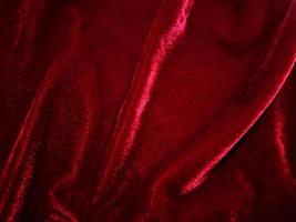 Red velvet fabric texture used as background. Empty Red fabric background of soft and smooth textile material. There is space for text. photo