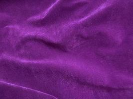 Dark purple old velvet fabric texture used as background. Empty purple fabric background of soft and smooth textile material. There is space for text.. photo