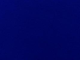 Felt blue  soft rough textile material background texture close up,poker table,tennis ball,table cloth. Empty blue fabric background. photo