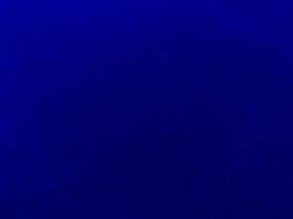 Blue velvet fabric texture used as background. Empty blue fabric background of soft and smooth textile material. There is space for text. photo