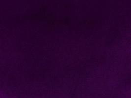 Purple velvet fabric texture used as background. Empty purple fabric background of soft and smooth textile material. There is space for text. photo
