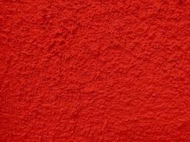 Seamless texture of red cement wall a rough surface, with space for text, for a background. photo