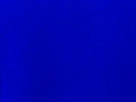 Blue velvet fabric texture used as background. Empty blue fabric background of soft and smooth textile material. There is space for text. photo