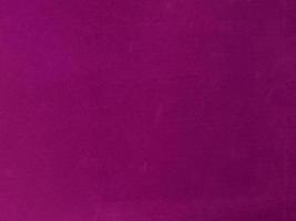Magenta velvet fabric texture used as background. Empty magenta fabric background of soft and smooth textile material. There is space for text. photo