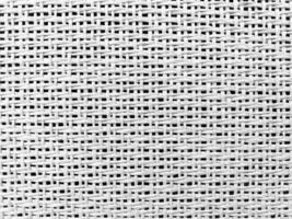 Close up white The  is woven into a net. natura rope texture as a background. Full frame of tightly woven rope pattern.with space for text, for a background. photo