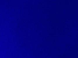 Dark blue velvet fabric texture used as background. Empty dark blue fabric background of soft and smooth textile material. There is space for text. photo
