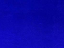 Blue velvet fabric texture used as background. Empty blue fabric background of soft and smooth textile material. There is space for text. photo