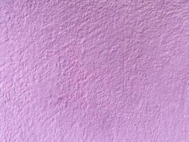 Seamless texture of purple cement wall a rough surface, with space for text, for a background. photo