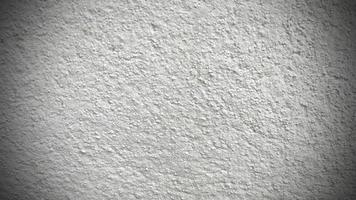 Seamless texture of white cement wall a rough surface, with space for text, for a background. Ready to use vignette. photo