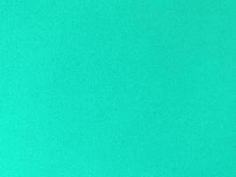 Mint green velvet fabric texture used as background. Empty green fabric background of soft and smooth textile material. There is space for text. photo