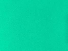 Mint green velvet fabric texture used as background. Empty green fabric background of soft and smooth textile material. There is space for text. photo