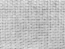Close up white The  is woven into a net. natura rope texture as a background. Full frame of tightly woven rope pattern.with space for text, for a background. photo