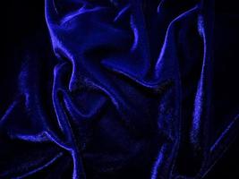 Blue velvet fabric texture used as background. Empty blue fabric background of soft and smooth textile material. There is space for text. photo