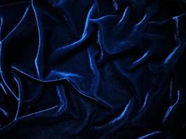 Blue velvet fabric texture used as background. Empty blue fabric background of soft and smooth textile material. There is space for text. photo