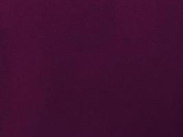 Purple magenta velvet fabric texture used as background. Empty purple fabric background of soft and smooth textile material. There is space for text.. photo