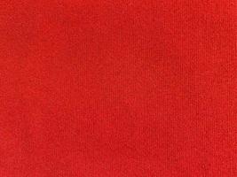 Red velvet fabric texture used as background. Empty red fabric background of soft and smooth textile material. There is space for text. photo