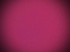 Felt pink soft rough textile material background texture close up,poker table,tennis ball,table cloth. Empty pink fabric background. photo
