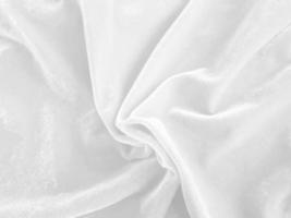 White velvet fabric texture used as background. Empty white fabric background of soft and smooth textile material. There is space for text. photo