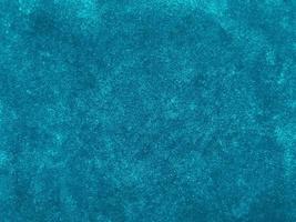 Blue velvet fabric texture used as background. Empty blue fabric background of soft and smooth textile material. There is space for text. photo