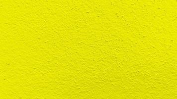 Seamless texture of yellow cement wall a rough surface, with space for text, for a background. photo