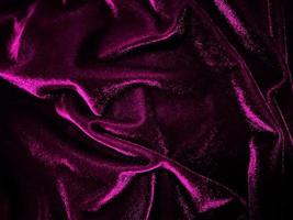 Magenta velvet fabric texture used as background. Empty magenta fabric background of soft and smooth textile material. There is space for text. photo