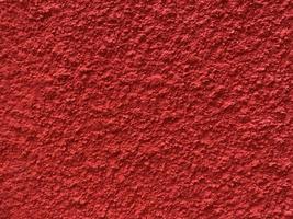 Seamless texture of red cement wall a rough surface, with space for text, for a background. photo